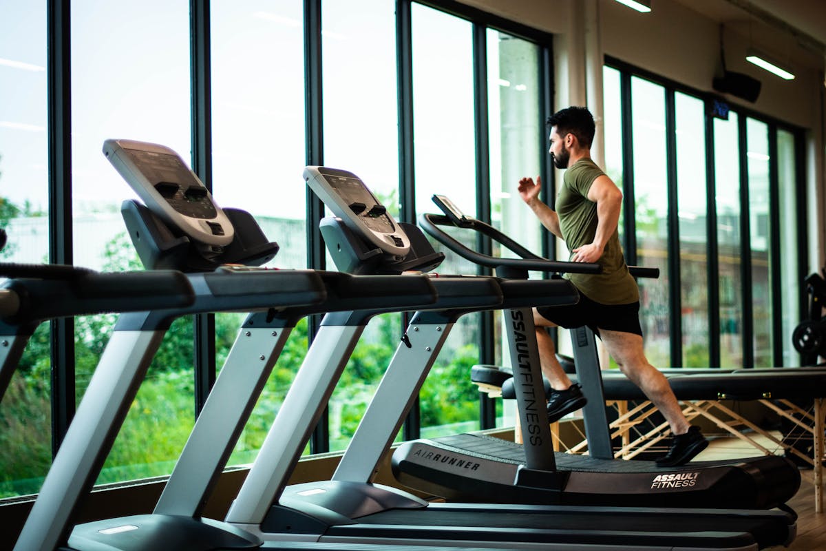 Boost Baseball strength gym with power racks and dumbbell rack.