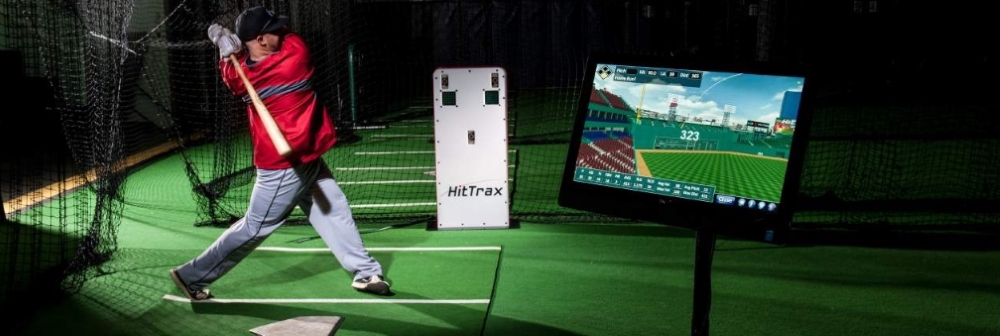 HitTrax sensor and display in a Boost Baseball indoor batting cage.